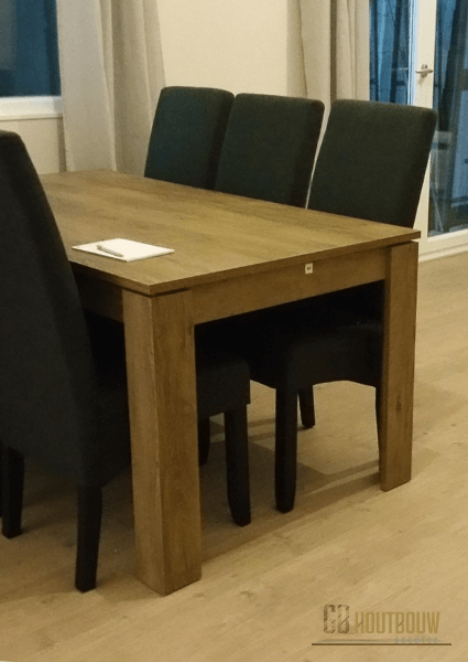 Eettafel met stoelen in woonkamer van een Mantelzorgwoning - Diverse interieur mogelijkheden - GB Houtbouw Dronten